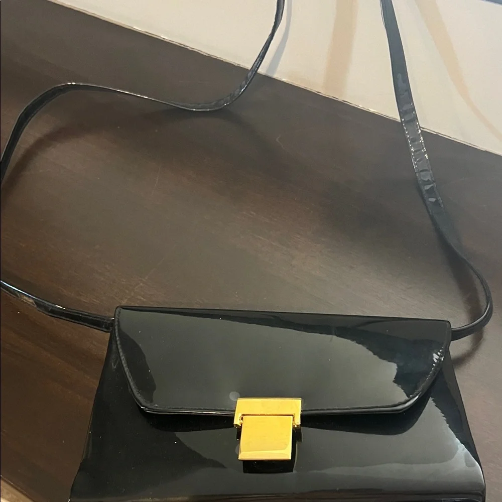 Glossy Black Patent Crossbody Bag with Gold Clasp